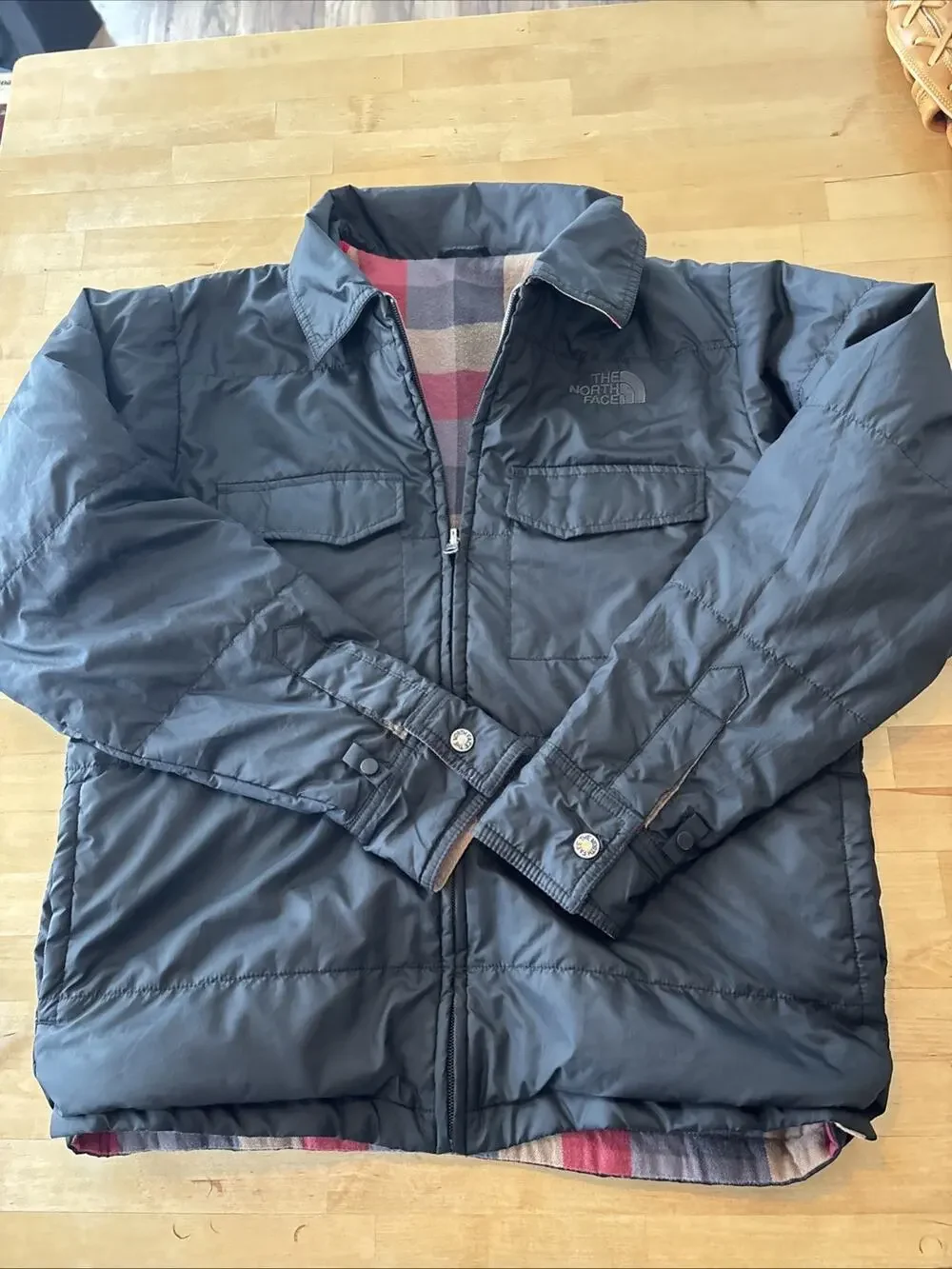 The North Face reversible padded jacket black and buffalo plaid flannel Medium